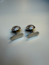 Mansjettknapper oksidert